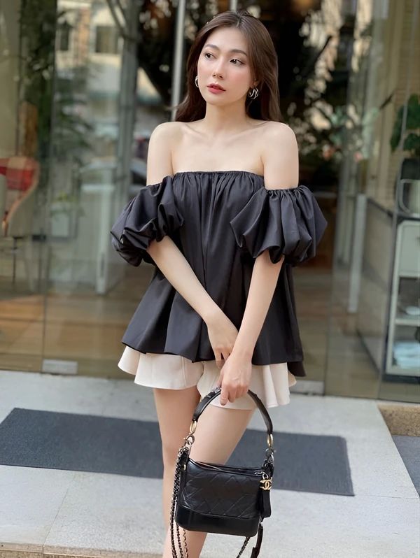 Gái xinh mặc áo trễ vai dưới ánh nắng nhẹ nhàng