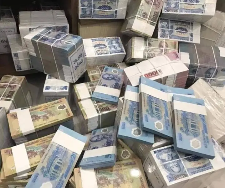 Ảnh tiền lẻ được sắp xếp thành xấp nhỏ gọn Ảnh tiền lẻ được sắp xếp thành xấp nhỏ gọn