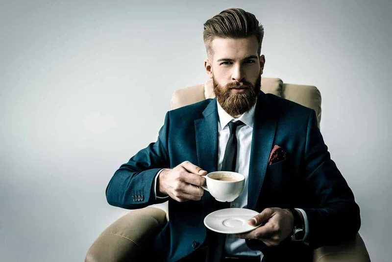 Trai đẹp ngồi uống cafe dưới ánh nắng dịu Trai đẹp ngồi uống cafe dưới ánh nắng dịu