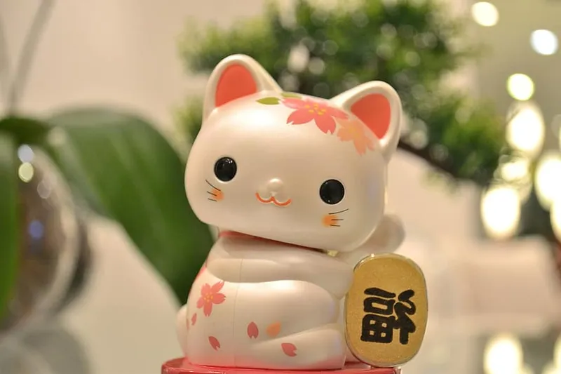 Cảm nhận niềm vui từ hình nền mèo thần tài dễ thương